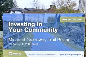 Signs indicates Langley City and TransLink plans for upgrades to the Michaud Greenway. (Mike Davenport/Special to Langley Advance Times)