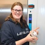 Marissa Metcalfe is a local Special Olympics athlete who tried her hand at making one of the Tim Horton fundraising donuts. (Heather Colpitts/Langley Advance Times)