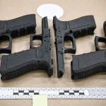 3D printed guns seized by CFSEU during a 2021 raid. An Abbotsford man was recently sentenced to eight years in prison on gun and drug charges related to that incident. (CFSEU)