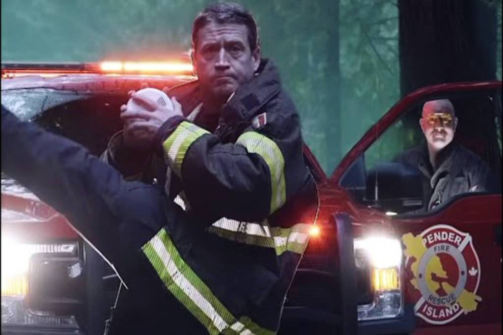 Captain Todd Bulled (left) and Captain John Grelik – also known as the &ldquo;yellow glasses guy&rdquo; – in their world-famous Twilight parody Instagram reel, which has garnered more than two million likes across their social media platforms. (Photo via Pender Fire Instagram)