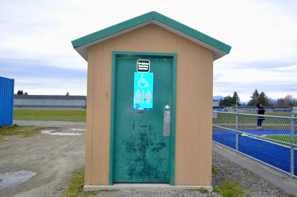 Coaches and parents say the existing pit toilet at Aldergrove Athletic Park does not accommodate for busy weekends or larger sports events. (Saman Dara/Aldergrove Star)