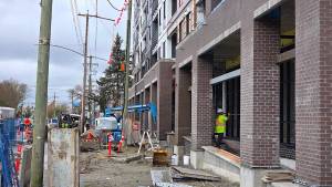 This under-construction condo project in Langley City turned out to be, ever so slightly, over the line, encroaching on a municipal road allowance. Council approved an easement Feb. 9. (Langley Advance Times files)