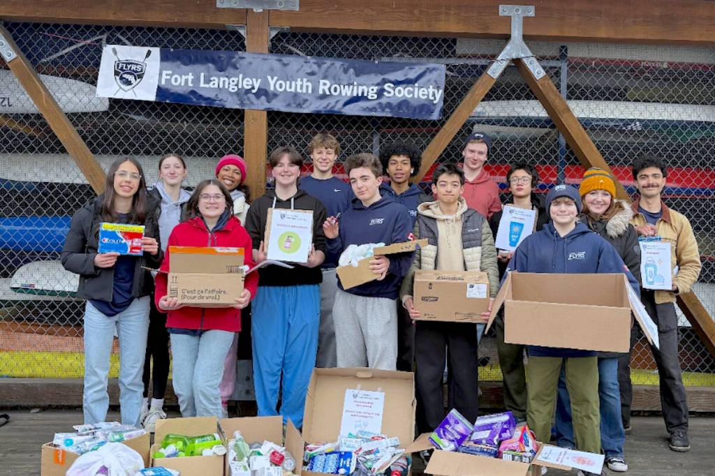 Over the Family Day weekend, Fort Langley Youth Rowing Society athletes in grades 8-12 distributed flyers in Fort Langley encouraging residents to donate new toiletries for young people accessing services at Foundry Langley. (Special to Langley Advance Times)