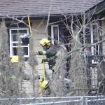Fire crews were called to the scene between 240 and 244 Streets on Fraser Highway Saturday morning. (Dan Ferguson/Langley Advance Times)