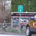 Fire crews were called to the scene between 240 and 244 Streets on Fraser Highway Saturday morning. (Dan Ferguson/Langley Advance Times)