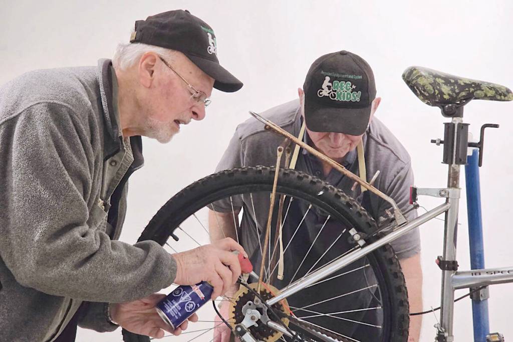 Volunteers at the first Fort Langley Repair Cafe, held Saturday March 7, worked on a bike. (Dan Ferguson/Langley Advance Times)